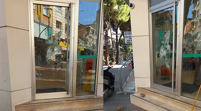 Alaşehir'de zihinsel engelli şahıs özel bir bankanın camlarını kırdı